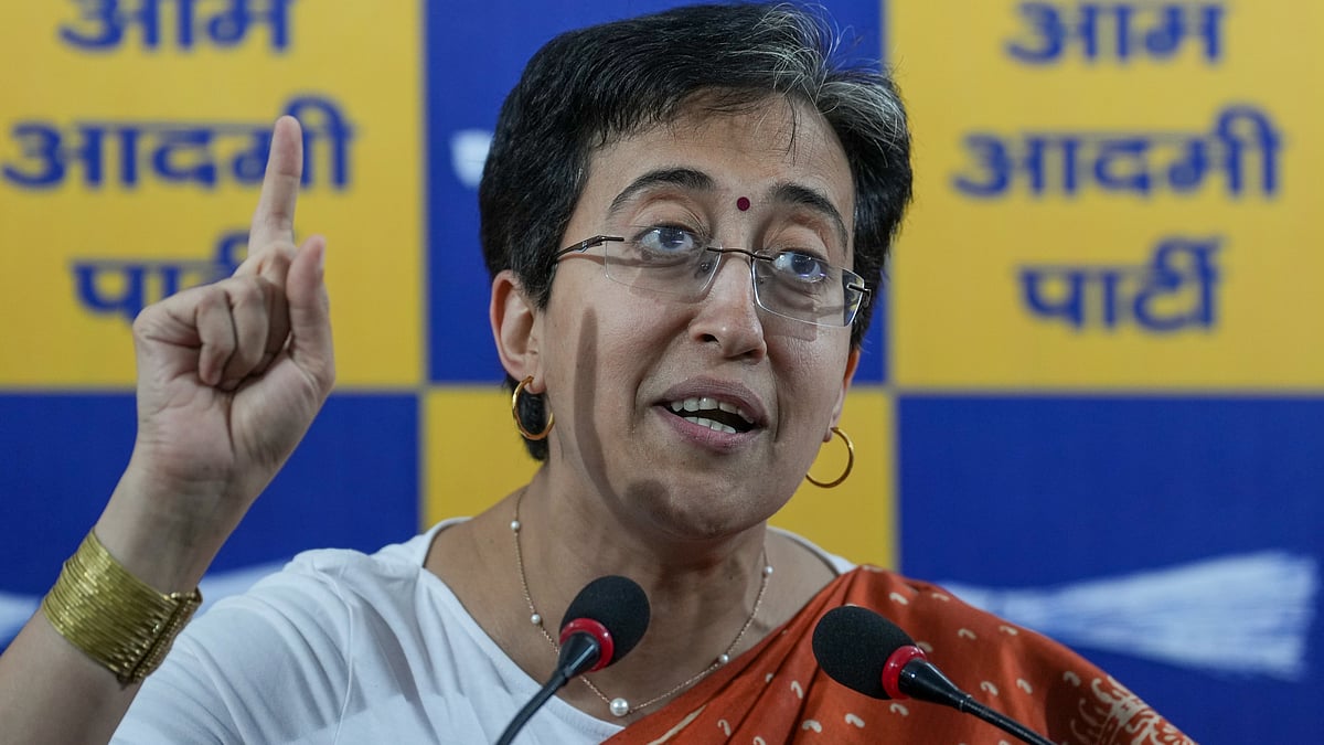 Atishi addresses a press conference in New Delhi on 8 March (photo: PTI)