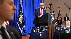 Donald Trump speaks at Justice Department in Washington on 14 March (photo: PTI)