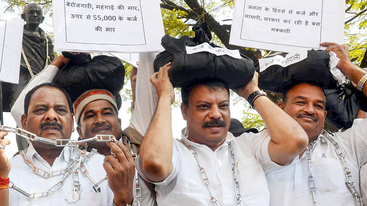Opposition leaders protest in Bhopal on 12 March (photo: PTI)