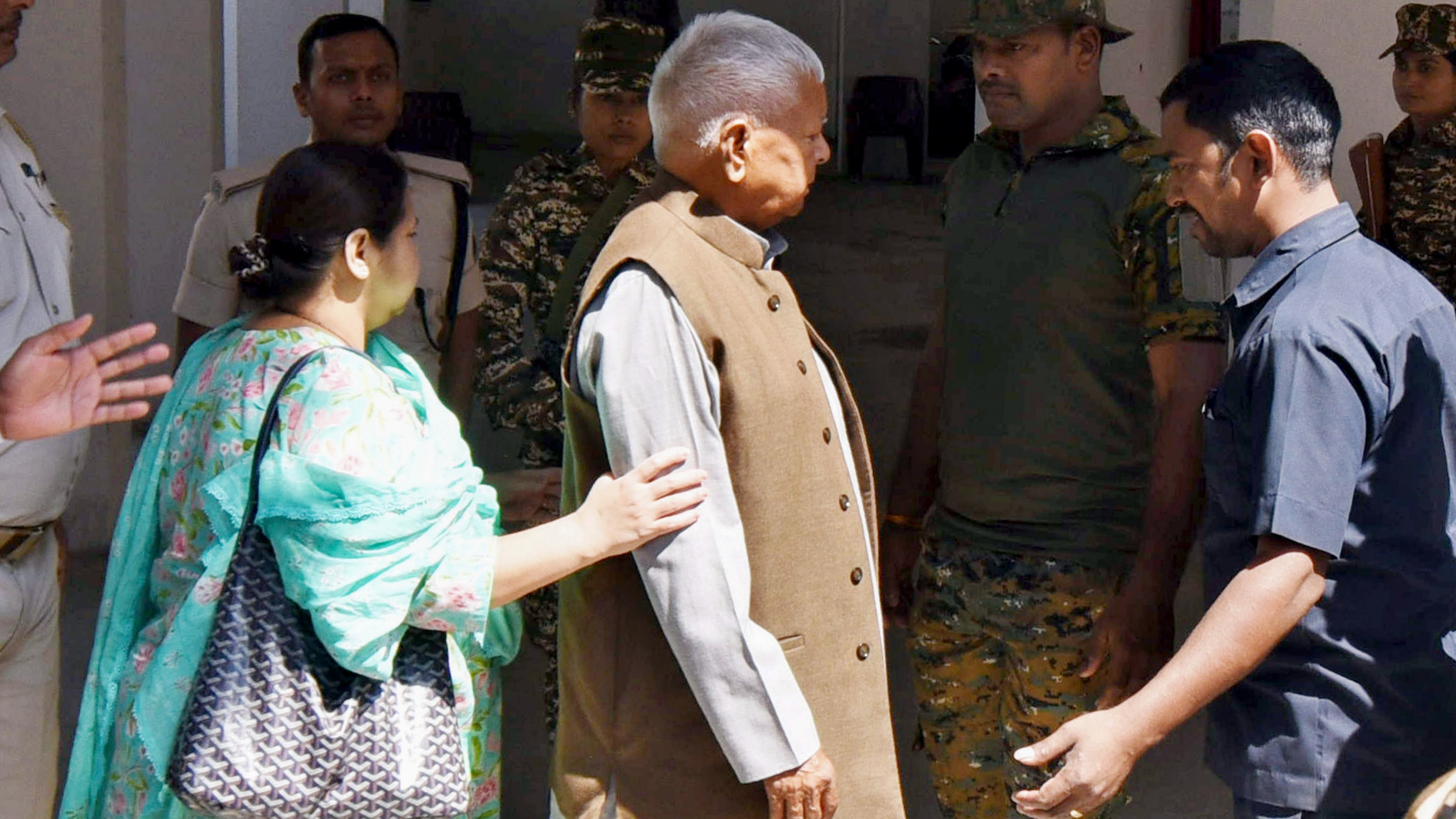 RJD chief Lalu Yadav with his daughter Misa Bharti arrives to appear before the ED