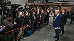 Donald Trump talks to reporters in Washington on 17 March (photo: PTI)