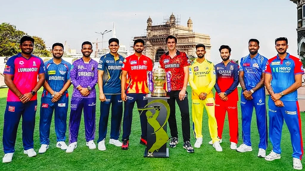 All 10 IPL team captains pose with the trophy in Mumbai