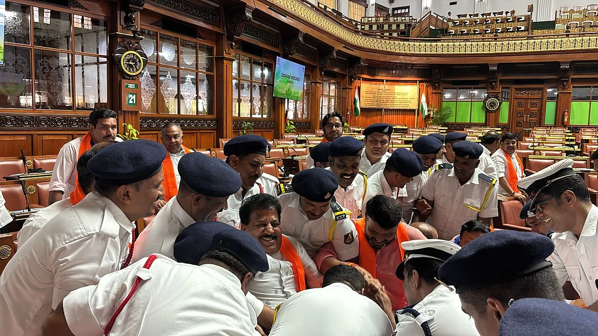 Marshals remove BJP MLAs who refused to leave the House (photo: @swaraj76/X)