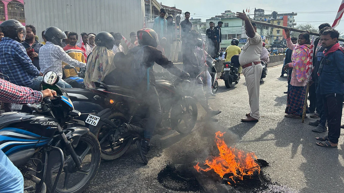 Tribal people block the Ranchi-Jamshedpur road on 22 March (photo: PTI)