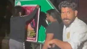 A signboard being vandalised  in Lutyens' Delhi on 28 March (photo: @HateDetectors/X)