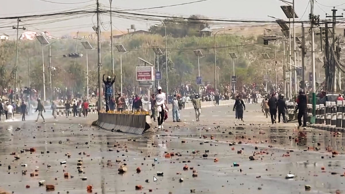 A Kathmandu street littered signs of the protestors-police clash (photo: PTI)