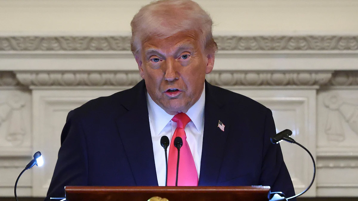 Donald Trump speaks at the White House on 27 March (photo: PTI)