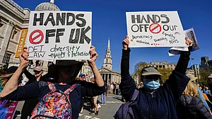 Protesters at a 'Hands Off!' rally against Trump and Musk, in London (photo: AP/PTI)