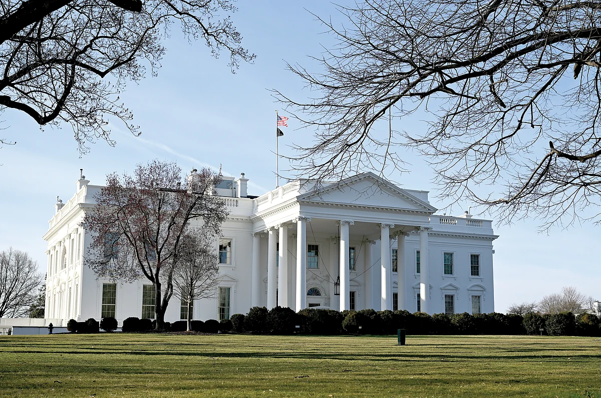 The White House with its signature orders holding up a neoclassical front porch