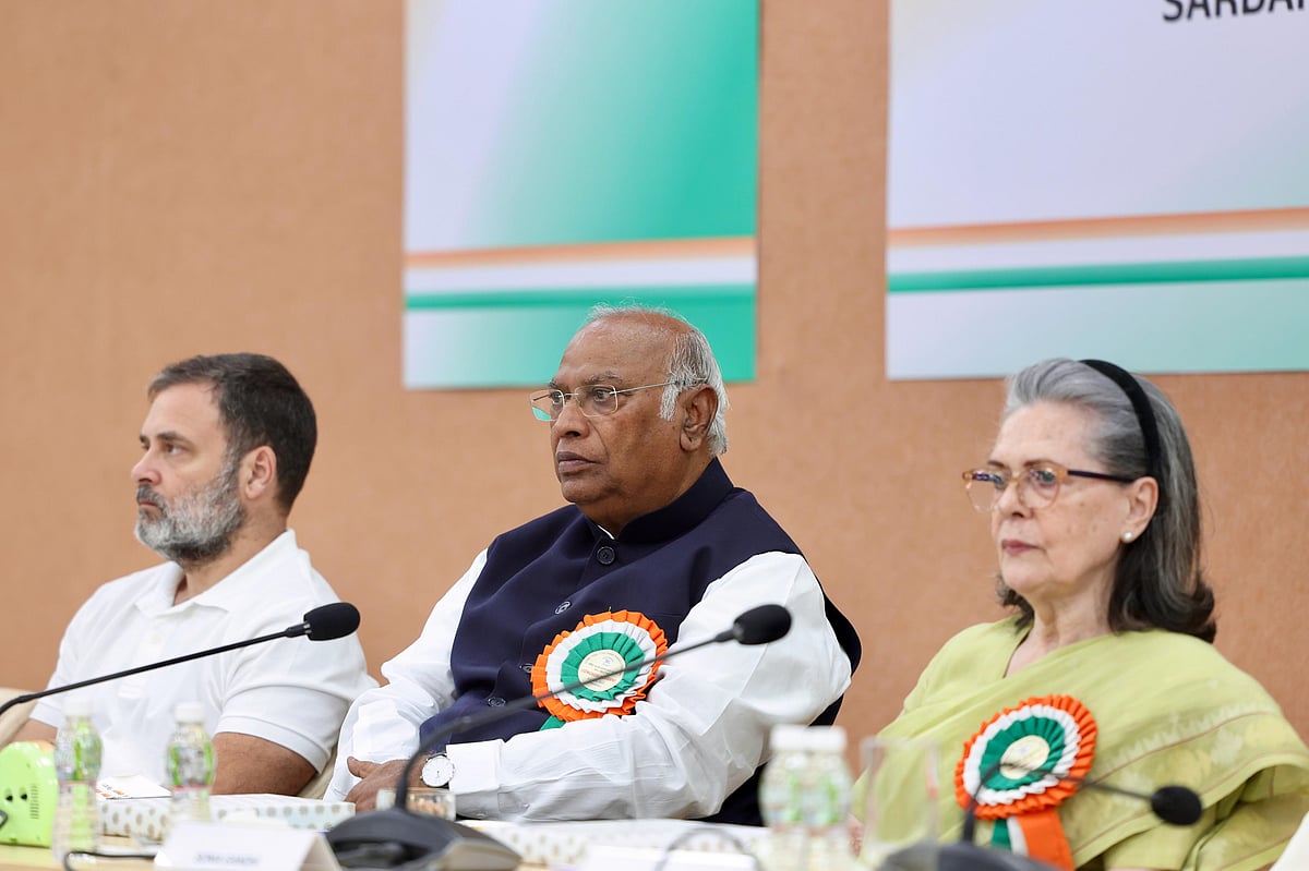 (L-R): Rahul Gandhi, Mallikarjun Kharge, and Sonia Gandhi at the CWC meet (photo: PTI)