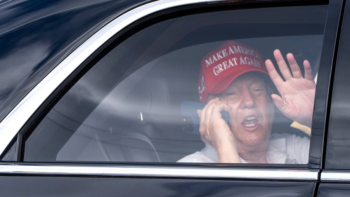 Donald Trump arrives at Trump International Golf Club on 4 April (photo: AP/PTI)