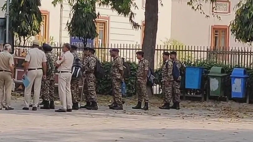 Police and security personnel in New Delhi on 10 April (photo: PTI)