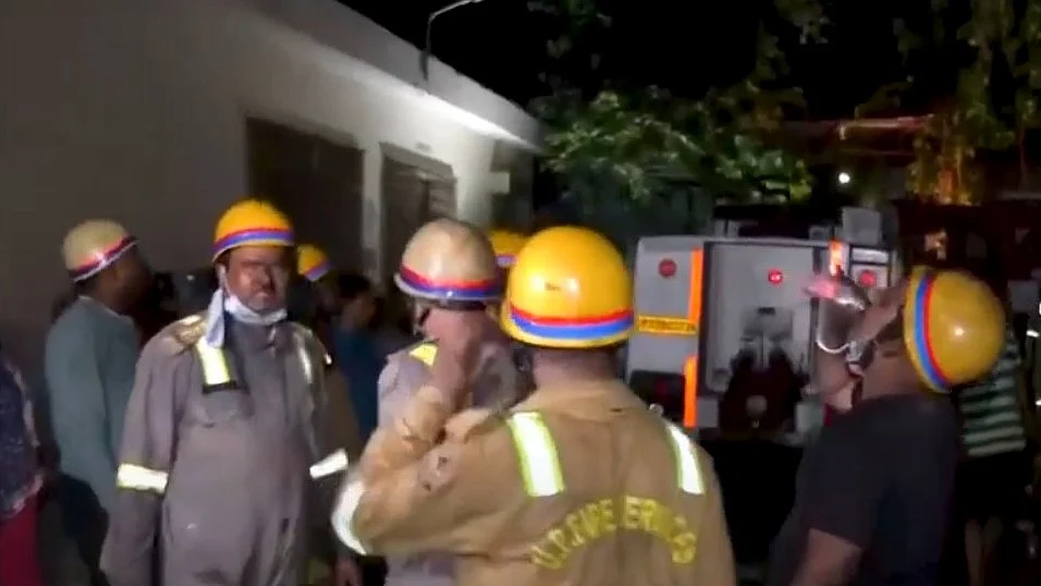 Fire brigade officials at Lokbandhu Hospital premises in Lucknow on 14 April (photo: IANS)