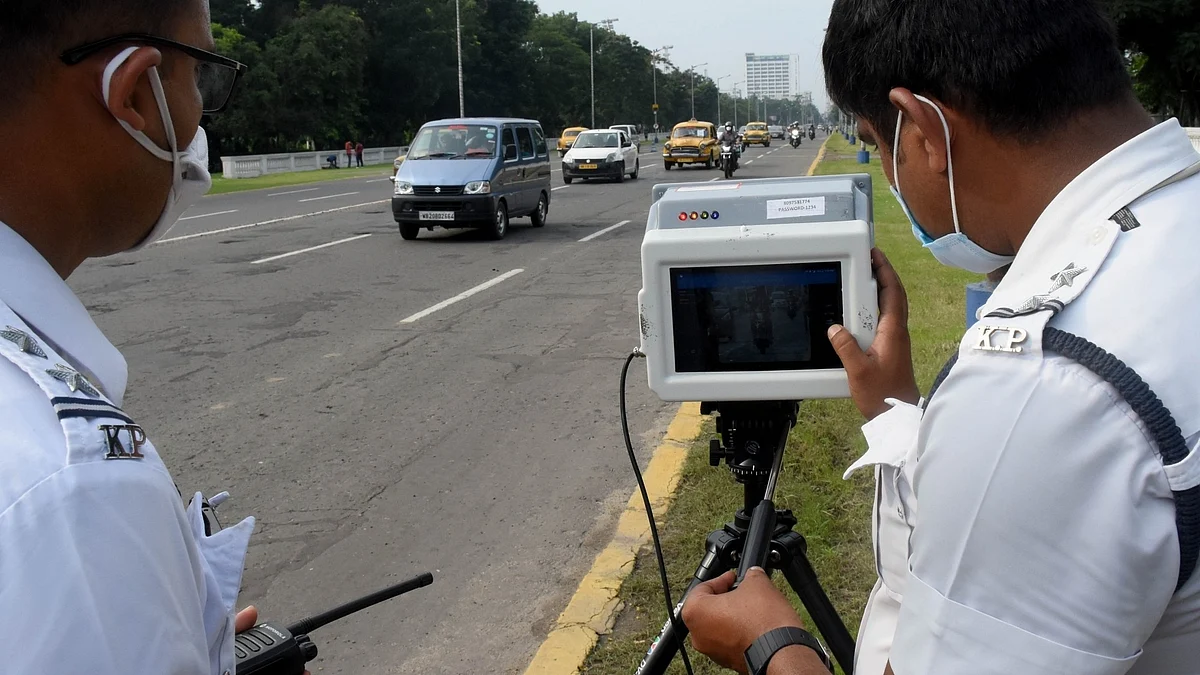 Policemen check speed of vehicles (photo: IANS)