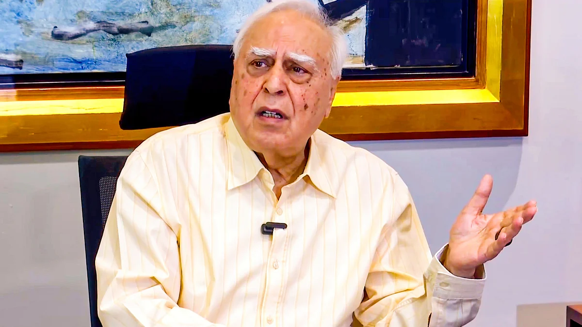 Kapil Sibal at the press meet (photo: PTI)