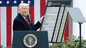 US President Donald Trump unveiling his weapon of trade destruction