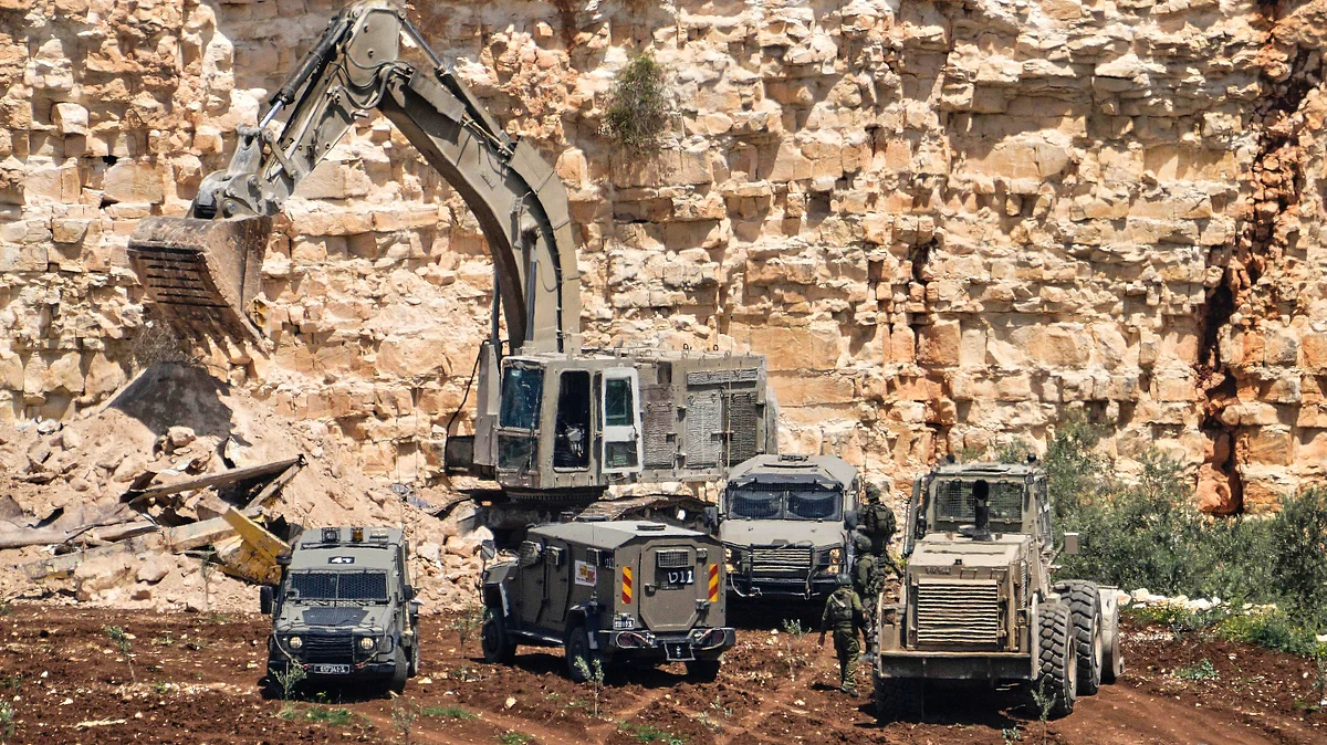 Israeli forces surround a quarry near the West Bank village of Qabatiya (photo: AP/PTI)