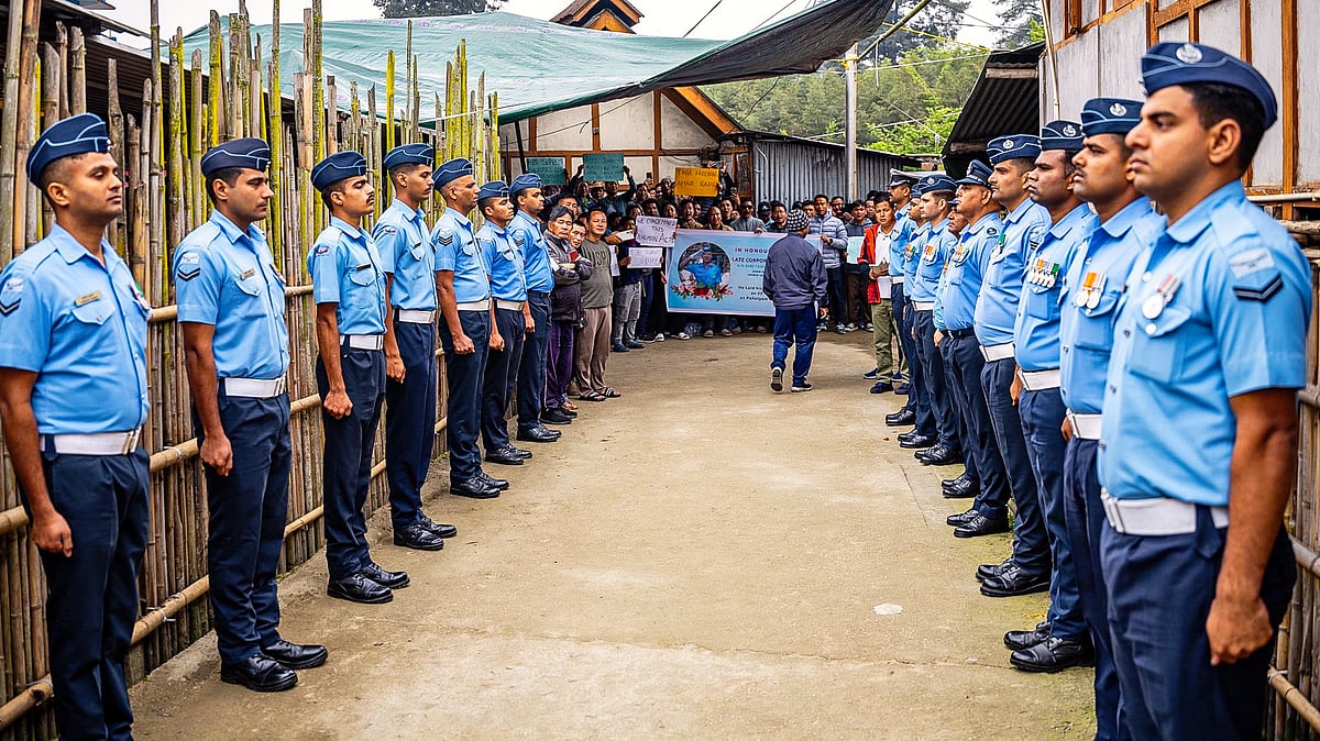 IAF personnel at the home of Corporal Tage Hailyang of Arunachal Pradesh (photo: PTI)