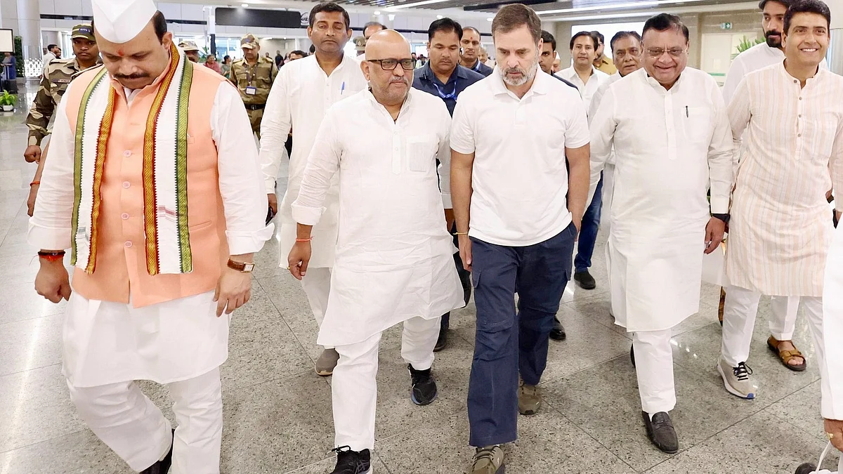 Rahul Gandhi with Ajay Rai at Lucknow airport on 29 April (photo: PTI)