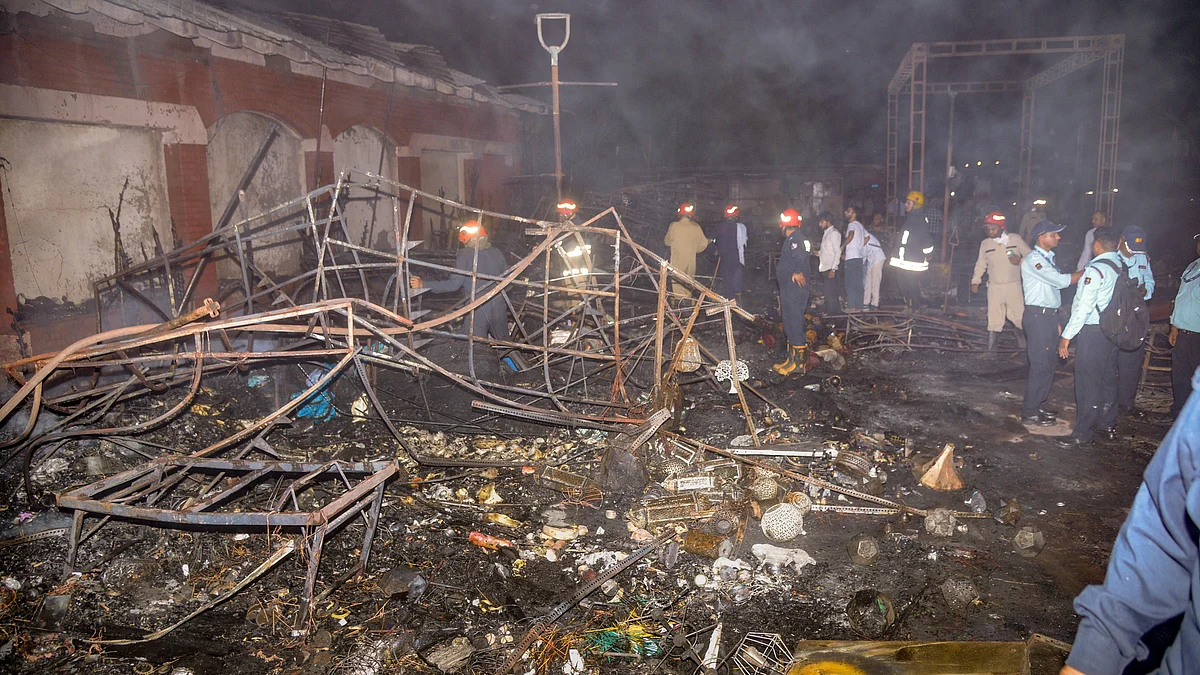 Shops damaged in fire at Dilli Haat on 30 April (photo: PTI)