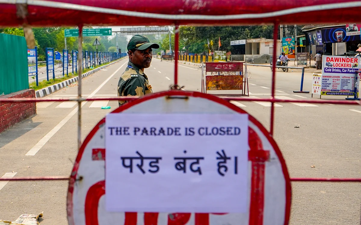A sign informing visitors that the traditional beating retreat ceremony at Punjab's Wagah-Attari border point is closed (photo: PTI)