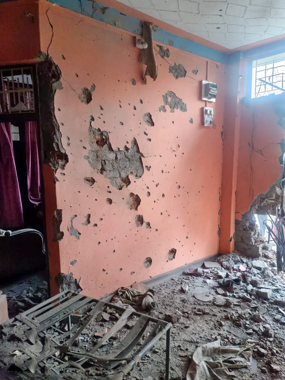 A house damaged by Pak shelling (photo: PTI)