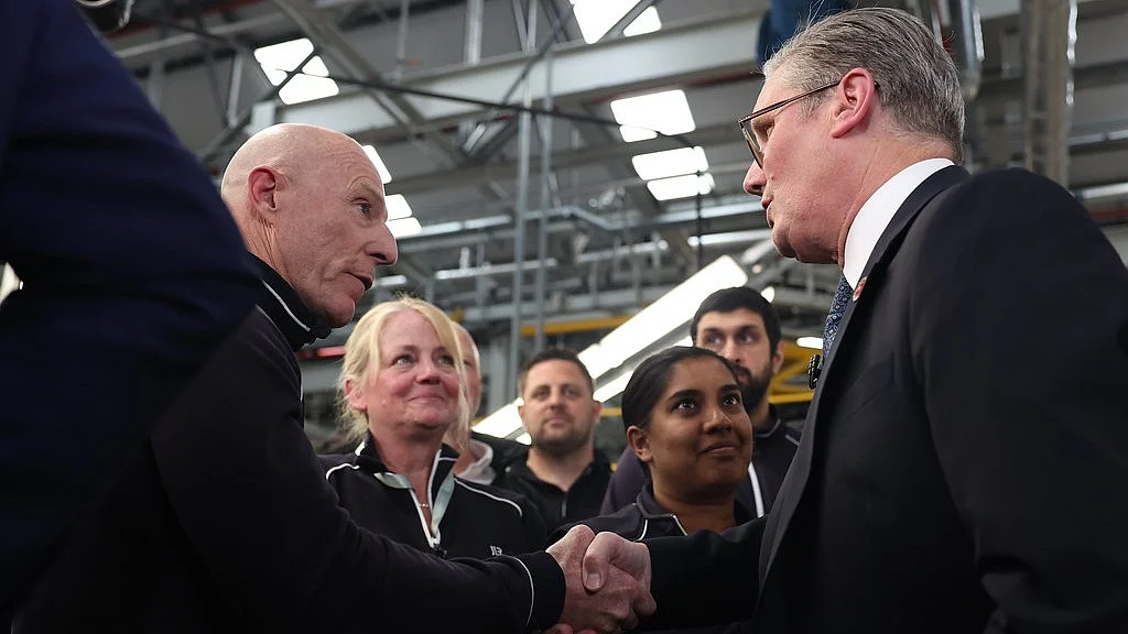 PM Keir Starmer with staff of Tata Motors’ Jaguar Land Rover plant, where he promised to save their jobs