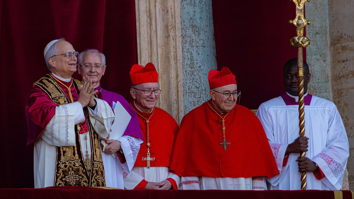 Pope Leo XIV (left) at Vatican on 8 May (photo: AP/PTI)