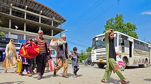 In Baramullah, citizens from border villages catch the bus home