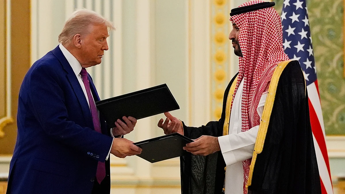 Trump and Saudi Crown Prince Mohammed bin Salman exchange documents in Riyadh (photo: AP/PTI)