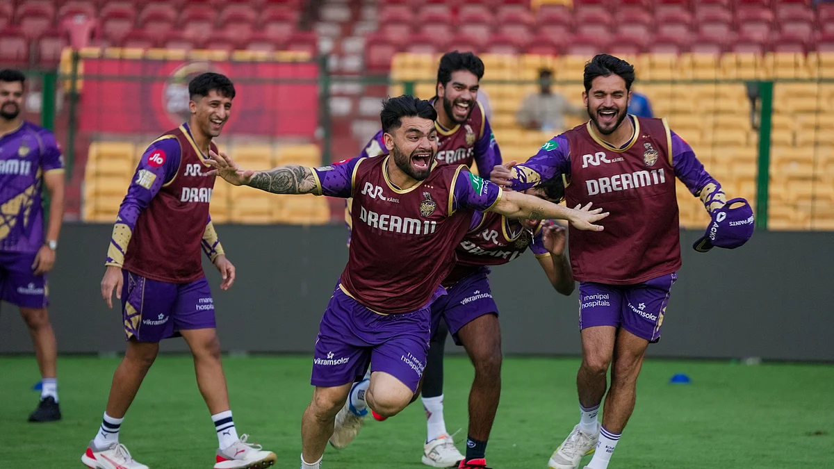 Members of KKR team in high spirits during practice at Chinnaswamy Stadium on Thursday
