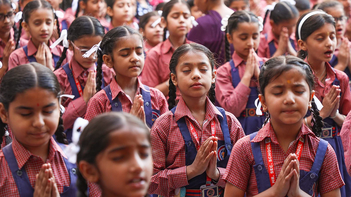 Students during a prayer meet at a school in Jammu on 15 May (photo: PTI)