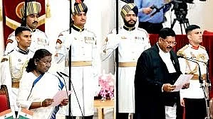 President Droupadi Murmu giving oath of office to Chief Justice BR Gavai.