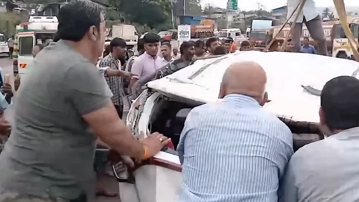 The damaged car on Mumbai-Goa Highway (photo: IANS)