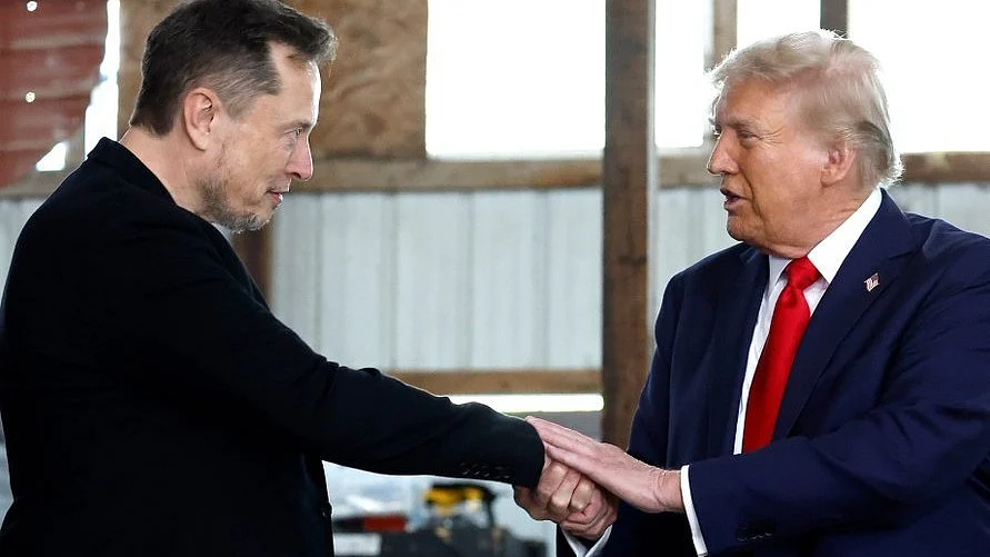 In happier times: Elon Musk and Donald Trump