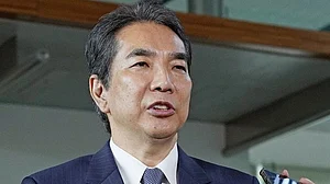 Japan’s agriculture minister resigns over his inappropriate remark about buying rice