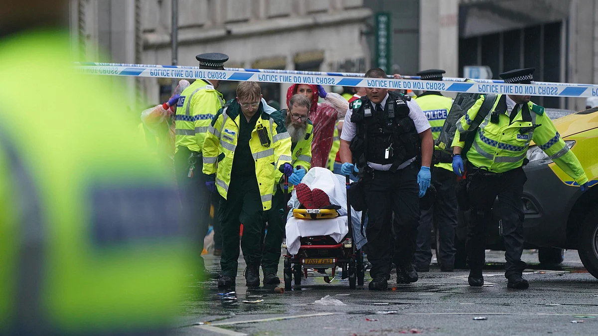 An injured person being shifted to hospital in Liverpool on 26 May (photo: AP/PTI)