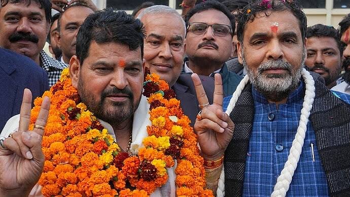 Sanjay Singh (right), the WFI president, with Brij Bhushan Singh (photo: social media)