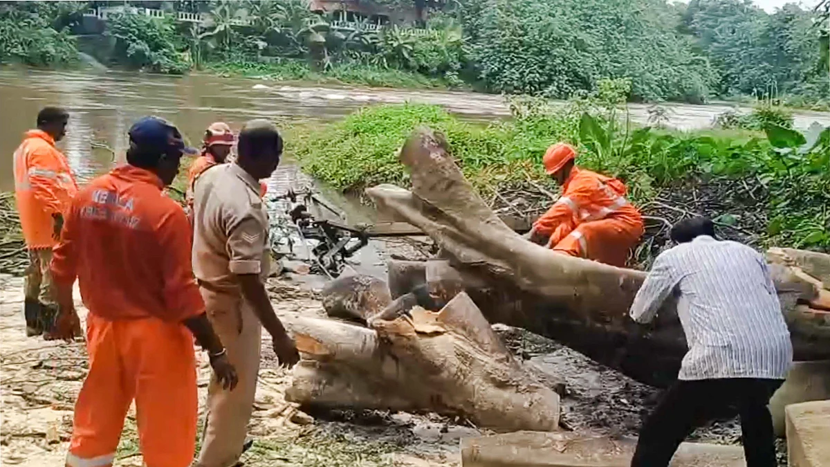 Clearing operations underway in Kochi after heavy rains left a trail of destruction. (PTI photo)