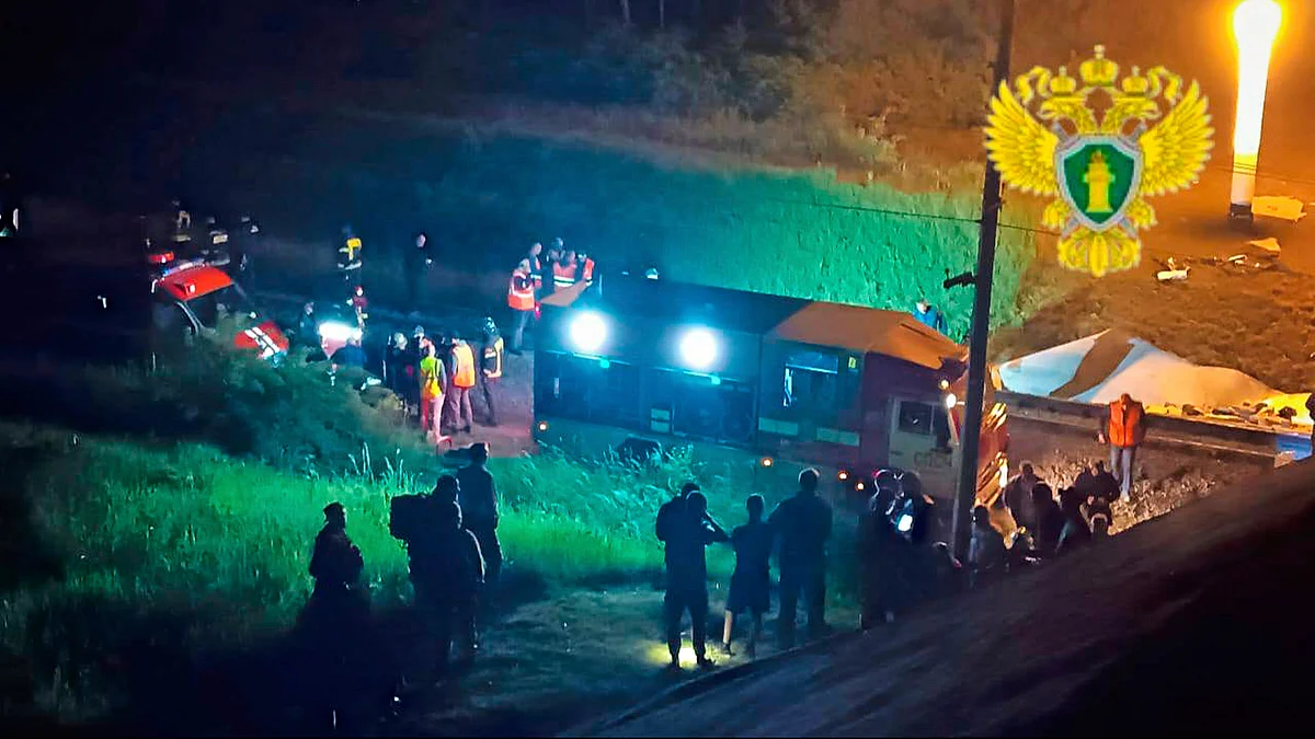 Emergency employees work at a damaged bridge in Russia's Bryansk on 1 June (photo: AP/PTI)