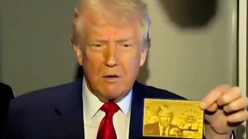 Donald Trump shows off his 'gold card' (video screengrab)