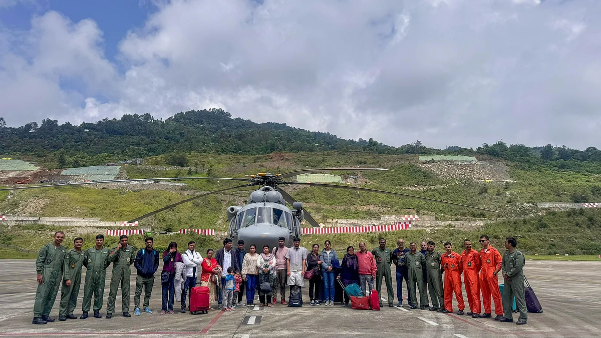 People being evacuated from a landslide-hit Chaten area in Sikkim on 5 June (photo: PTI)