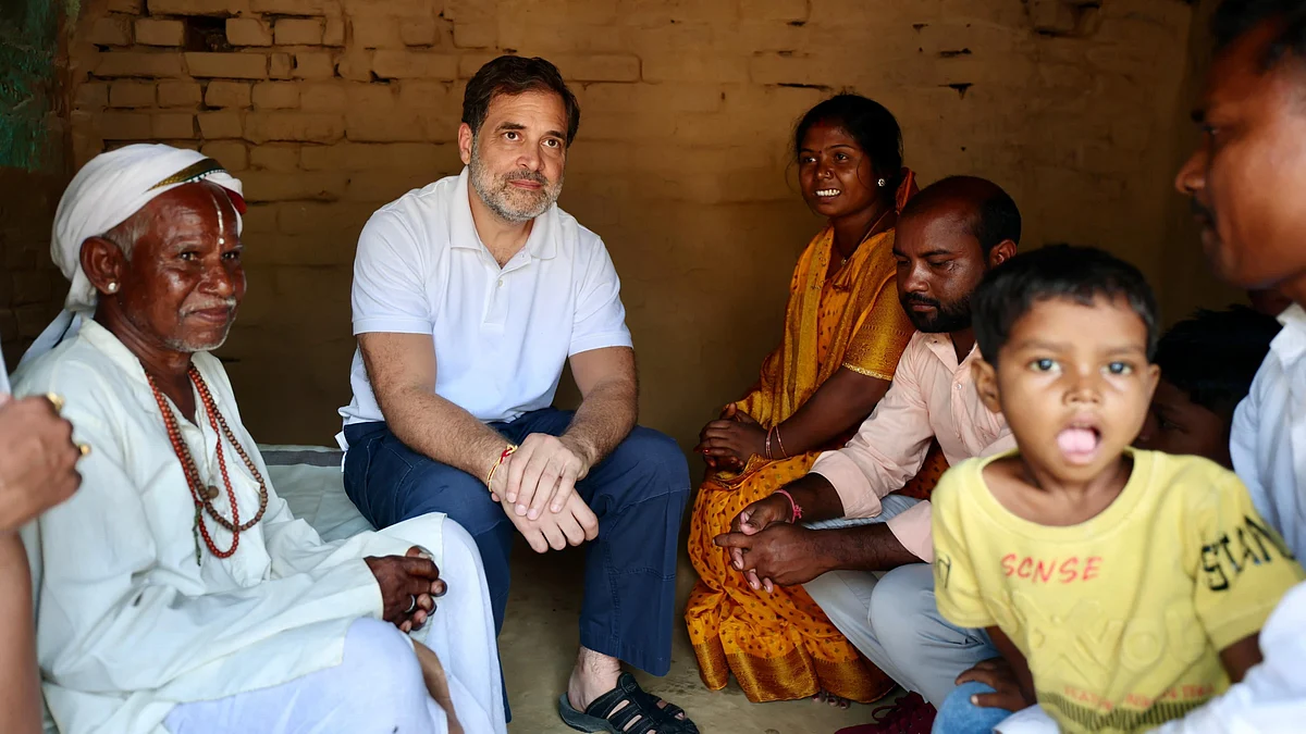 Rahul Gandhi with the Manjhi family in Bihar (photo: @INCIndia/X)