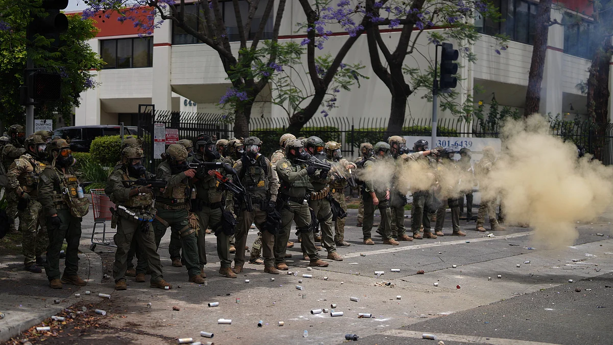 Border Patrol personnel deploy tear gas during a demonstration in Los Angeles on 7 June (photo: AP/PTI)