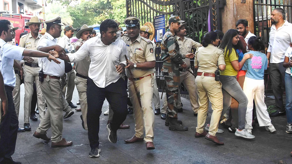 Police disperse the gathering at Chinnaswamy Stadium on 4 June (photo: IANS)