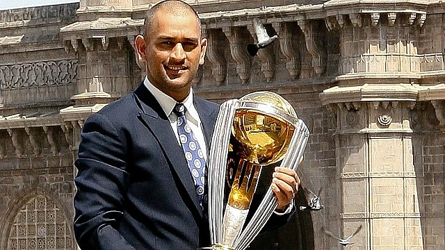 Mahendra Singh Dhoni with the 2011 World Cup (photo: BCCI)