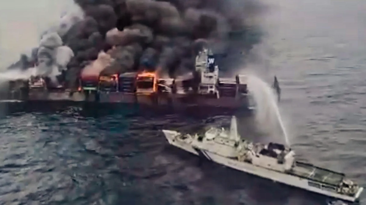 Indian Coast Guard ship carries out firefighting operation off Kerala coast on 10 June (photo: PTI)