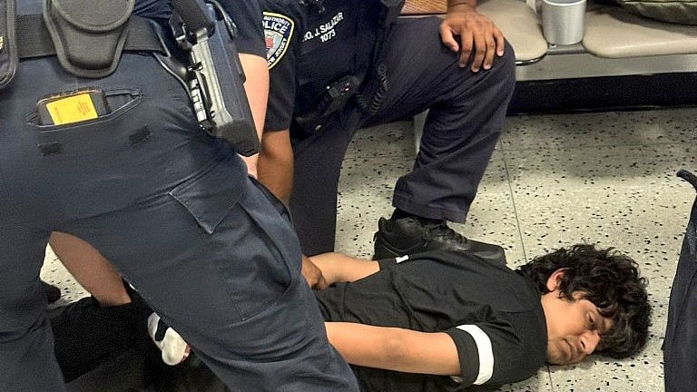 The crying Indian student pinned to the ground and cuffed at Newark airport 