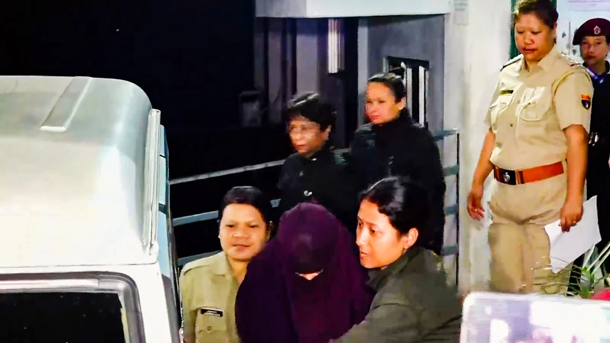 Shillong Police escort Sonam Raghuvanshi after her medical check-up on 11 June (photo: PTI)