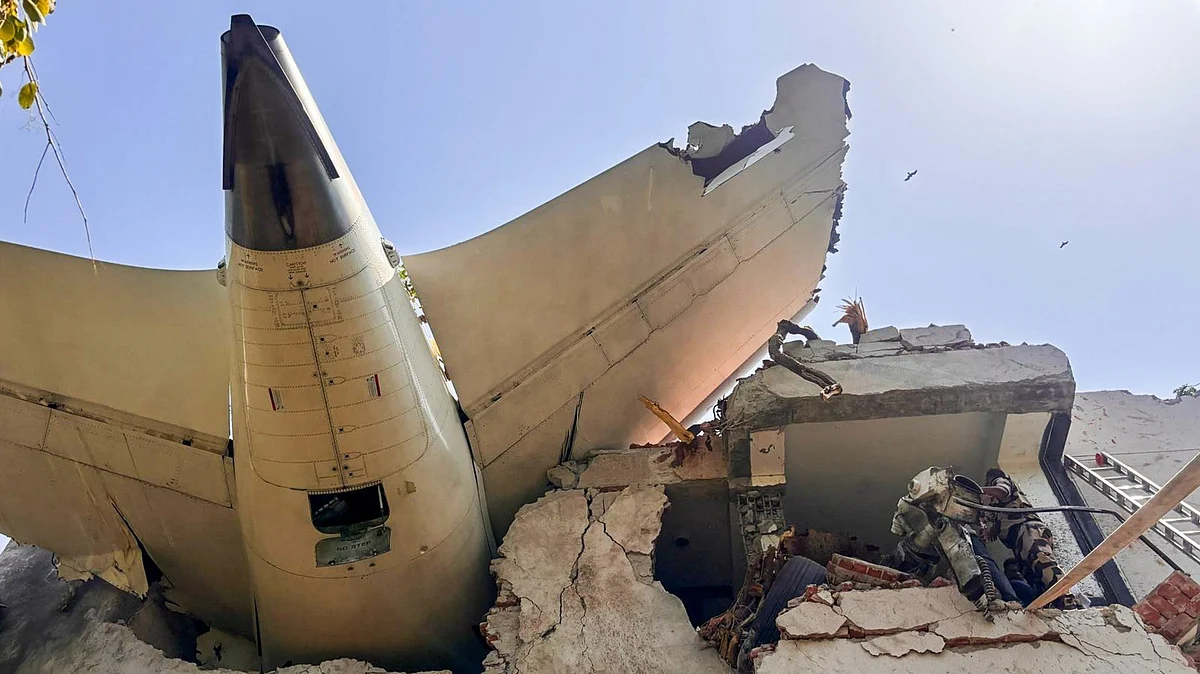 Tail section of AI171 sticks out of the BG Medical College mess near Ahmedabad airport